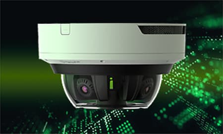 Hanwha Vision multi-directional AI camera over a green digital background.