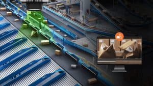 Aerial view of a package sorting conveyor system, with a monitor overlay showing an alert for improper box handling